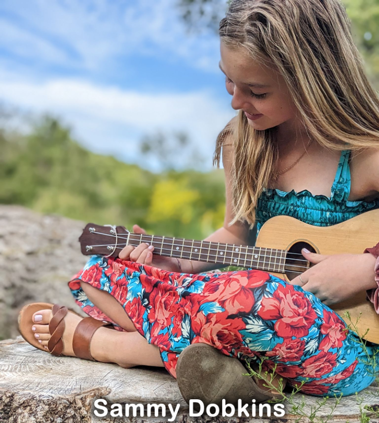 Sammy loves playing bluegrass, folk, old country and 50s do wop on the ukulele. She is from the hills around Ava, MO