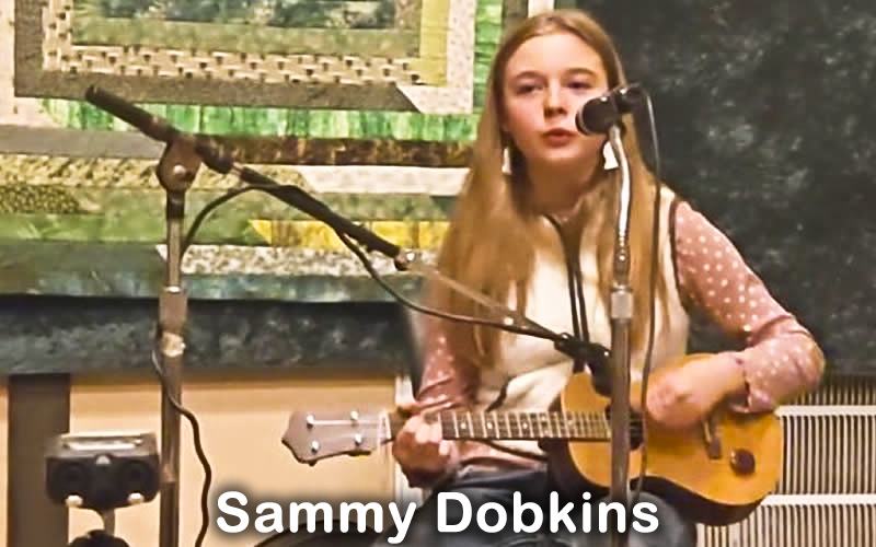 Sammy loves playing bluegrass, folk, old country and 50s do wop on the ukulele. She is from the hills around Ava, MO